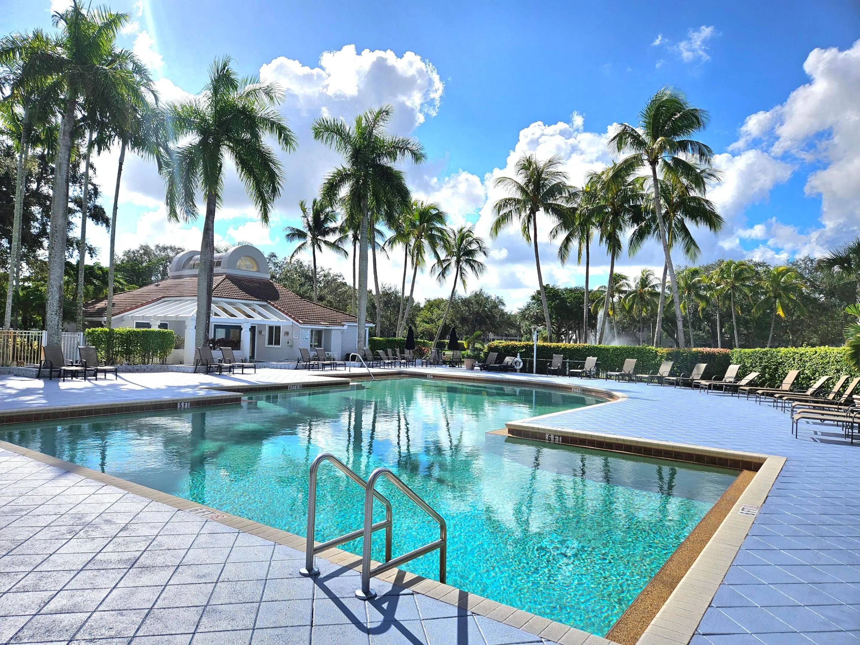 PLENTY OF LOUNGE CHAIRS TO ENJOY YOUR DAYS AT THE POOL