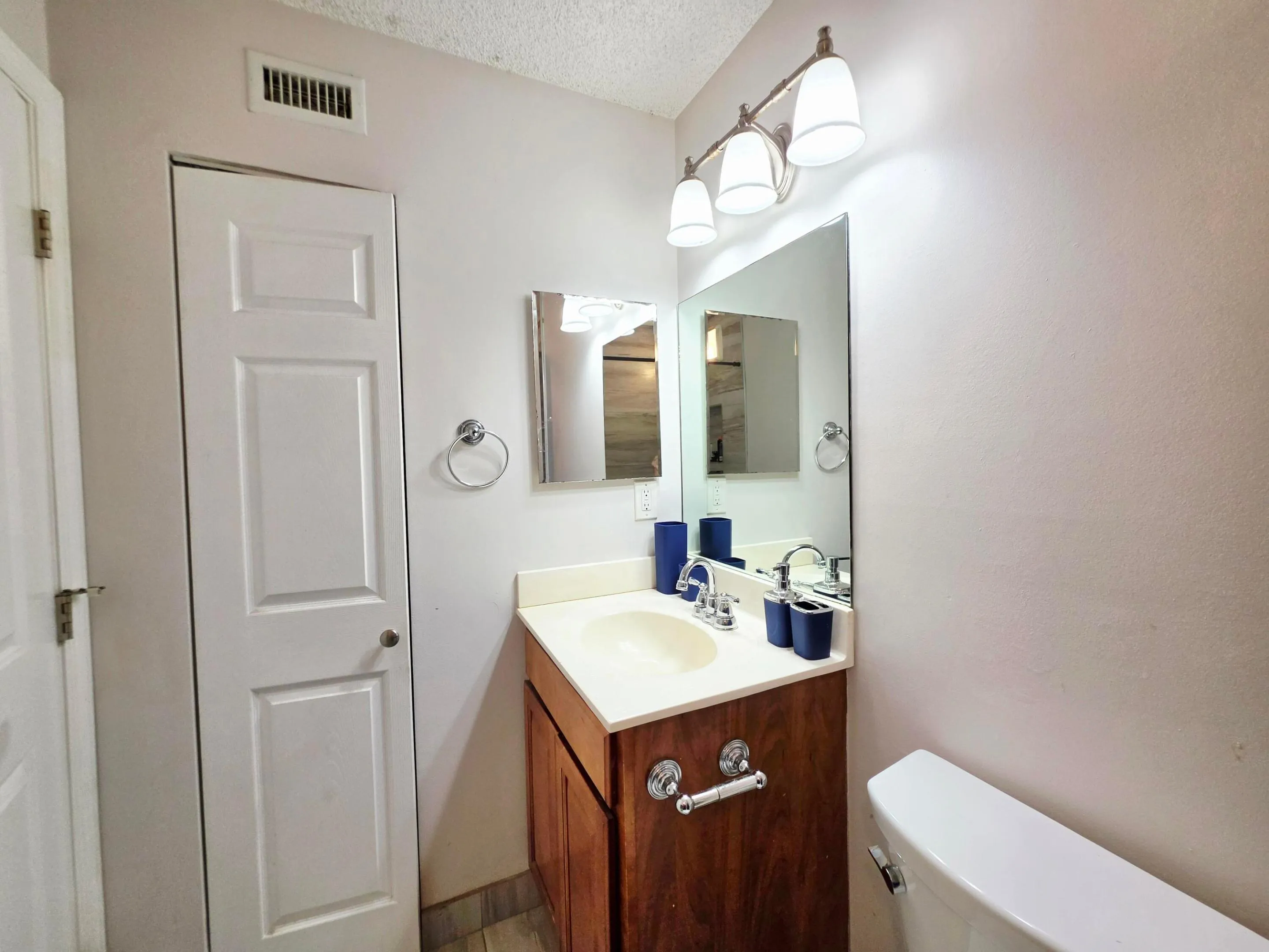 LINEN CLOSET IN THE BATHROOM
