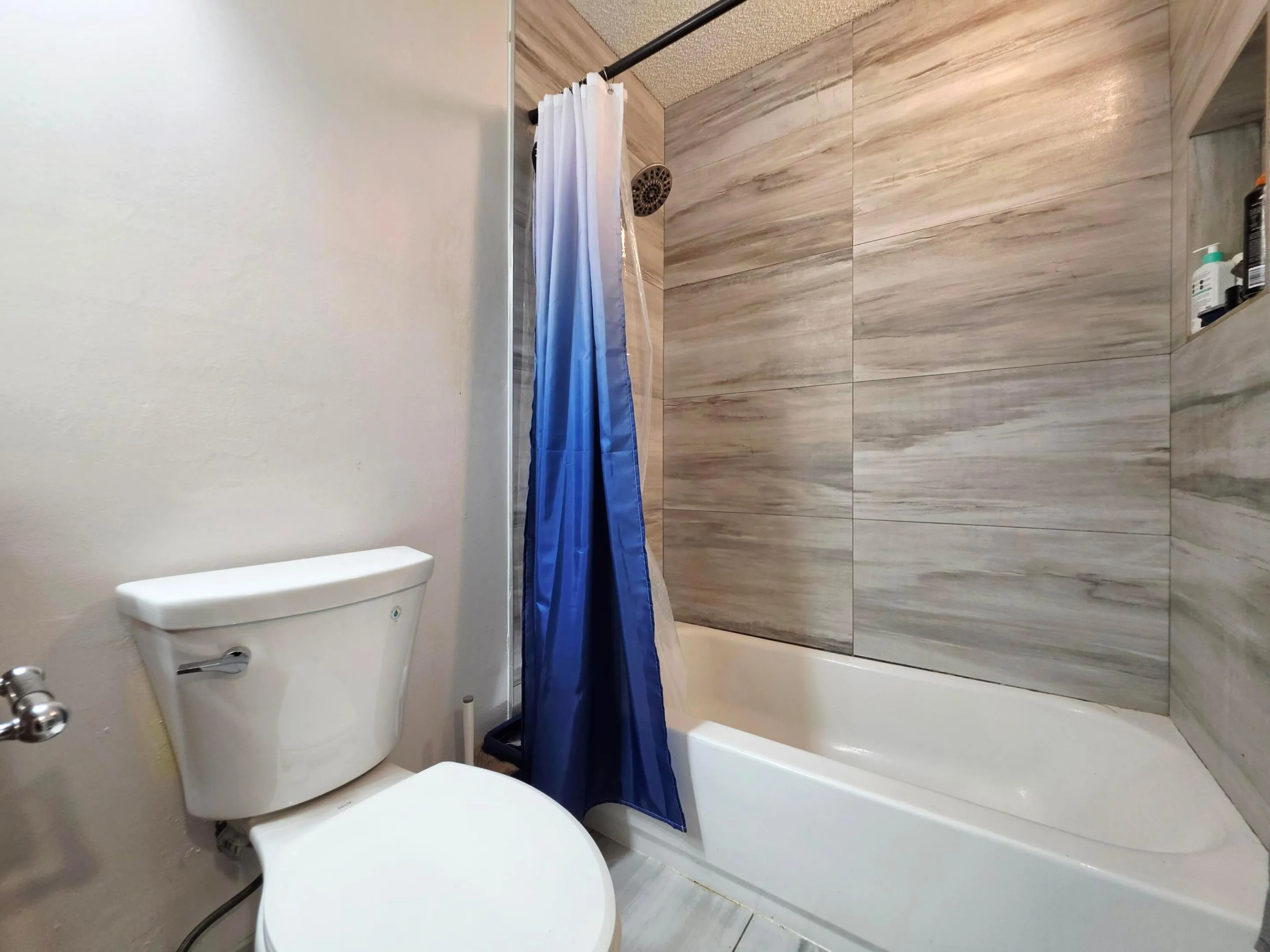 BEAUTIFULLY TILED TUB/SHOWER COMBINATION