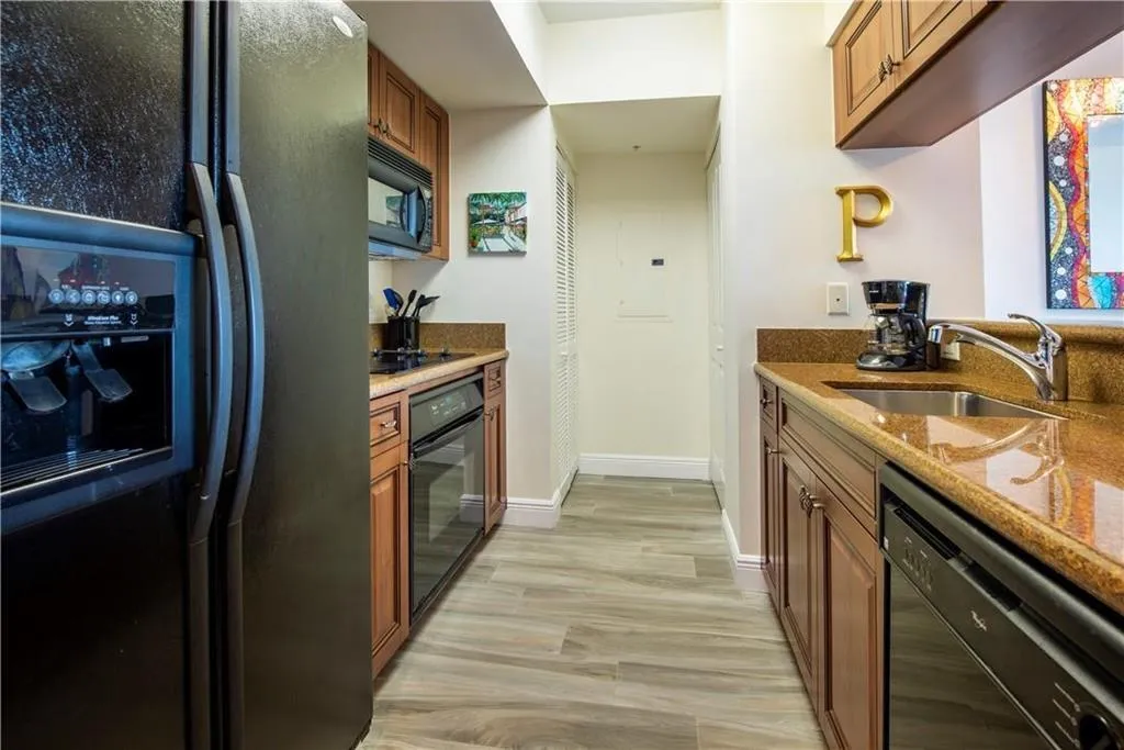 Washer/Dryer in closet on the left