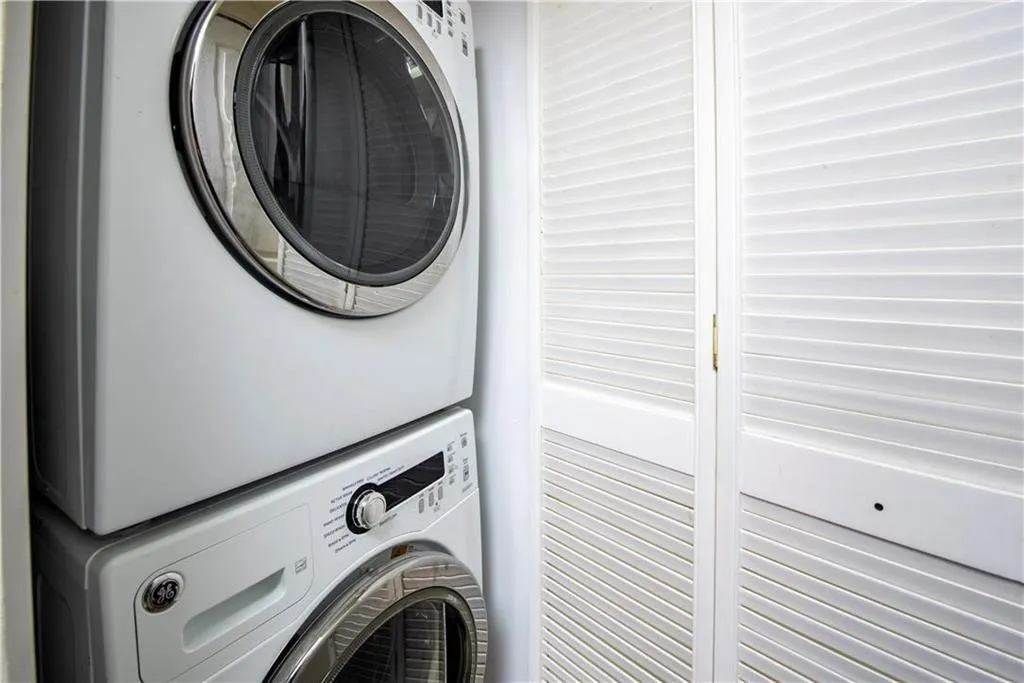 Laundry in unit (stack-up in closet in kitchen)