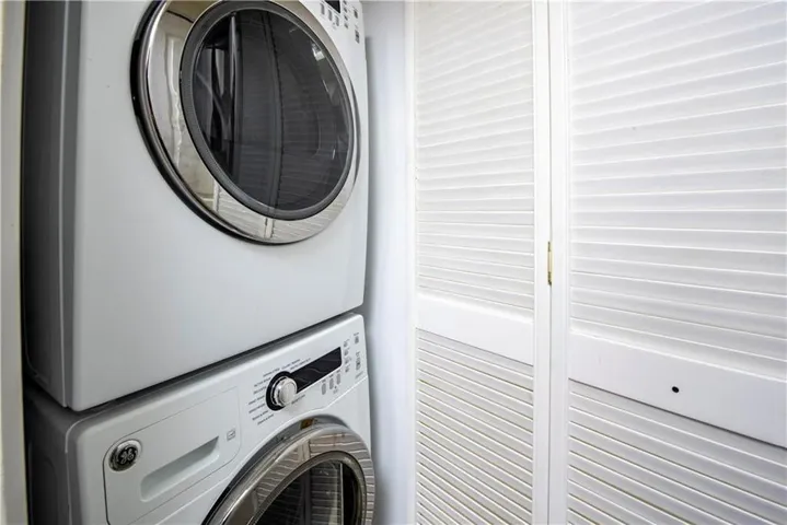Laundry in unit (stack-up in closet in kitchen)