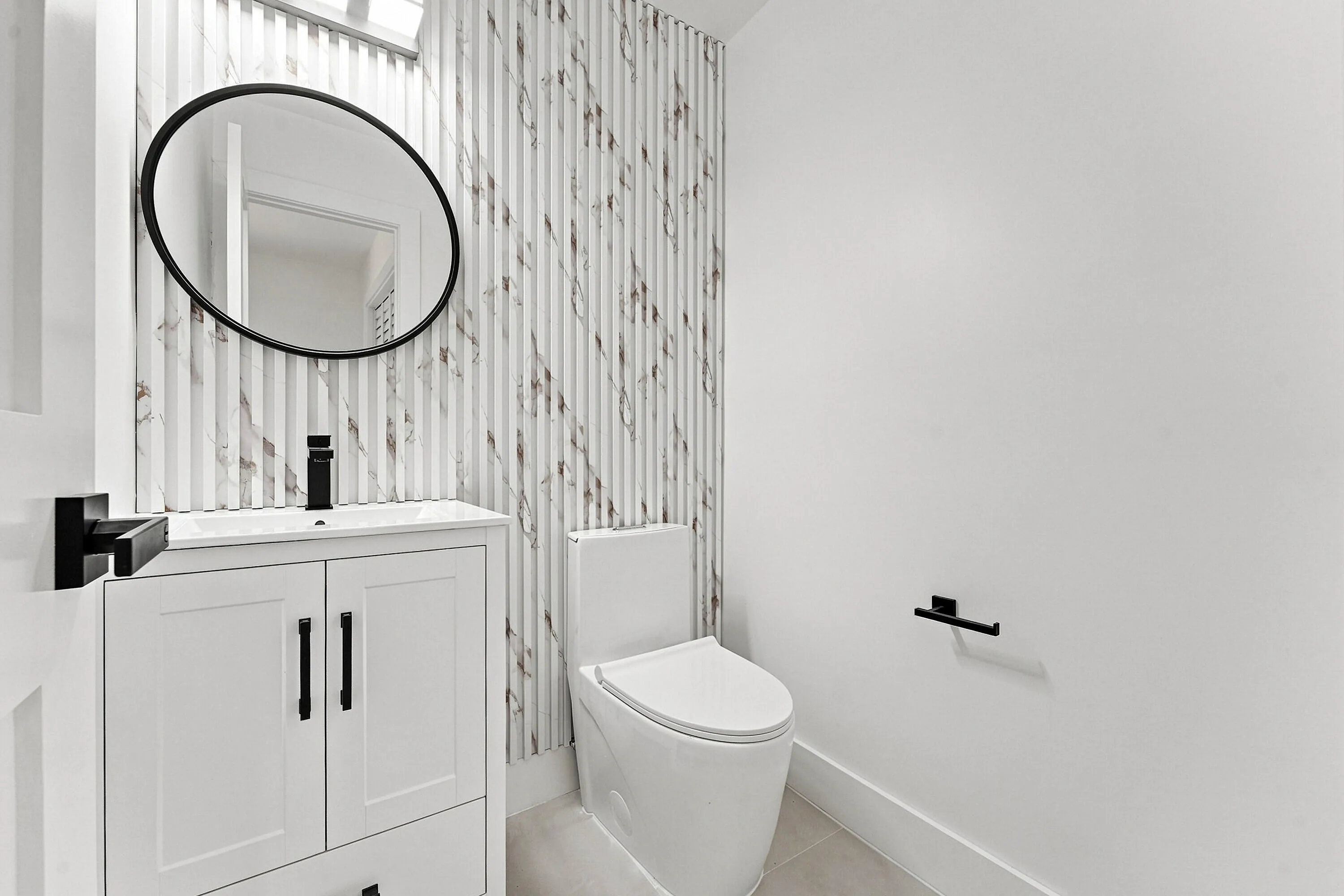 Half Bathroom inside Bedroom 3.