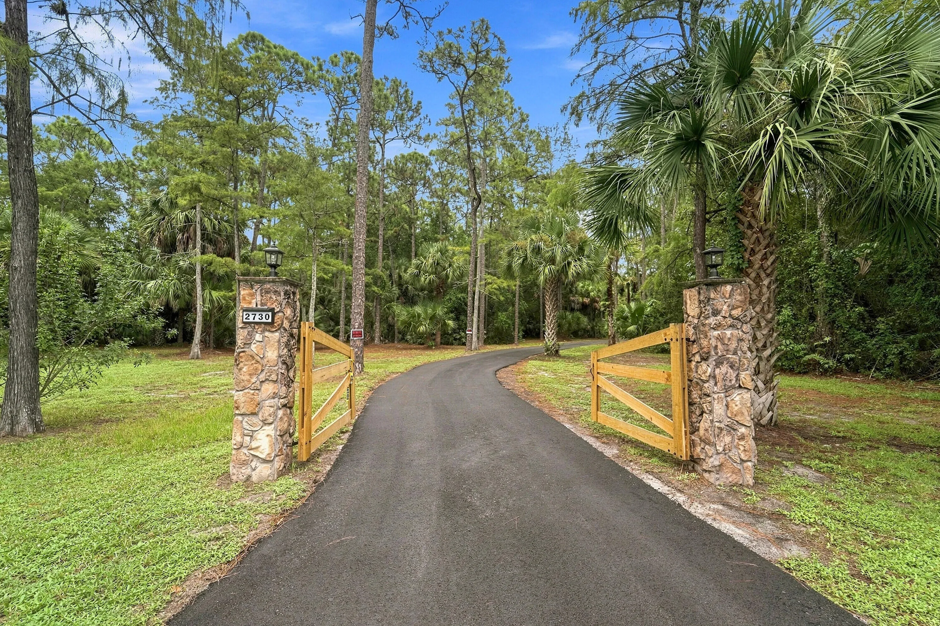 New Gates and Asphalt Driveway