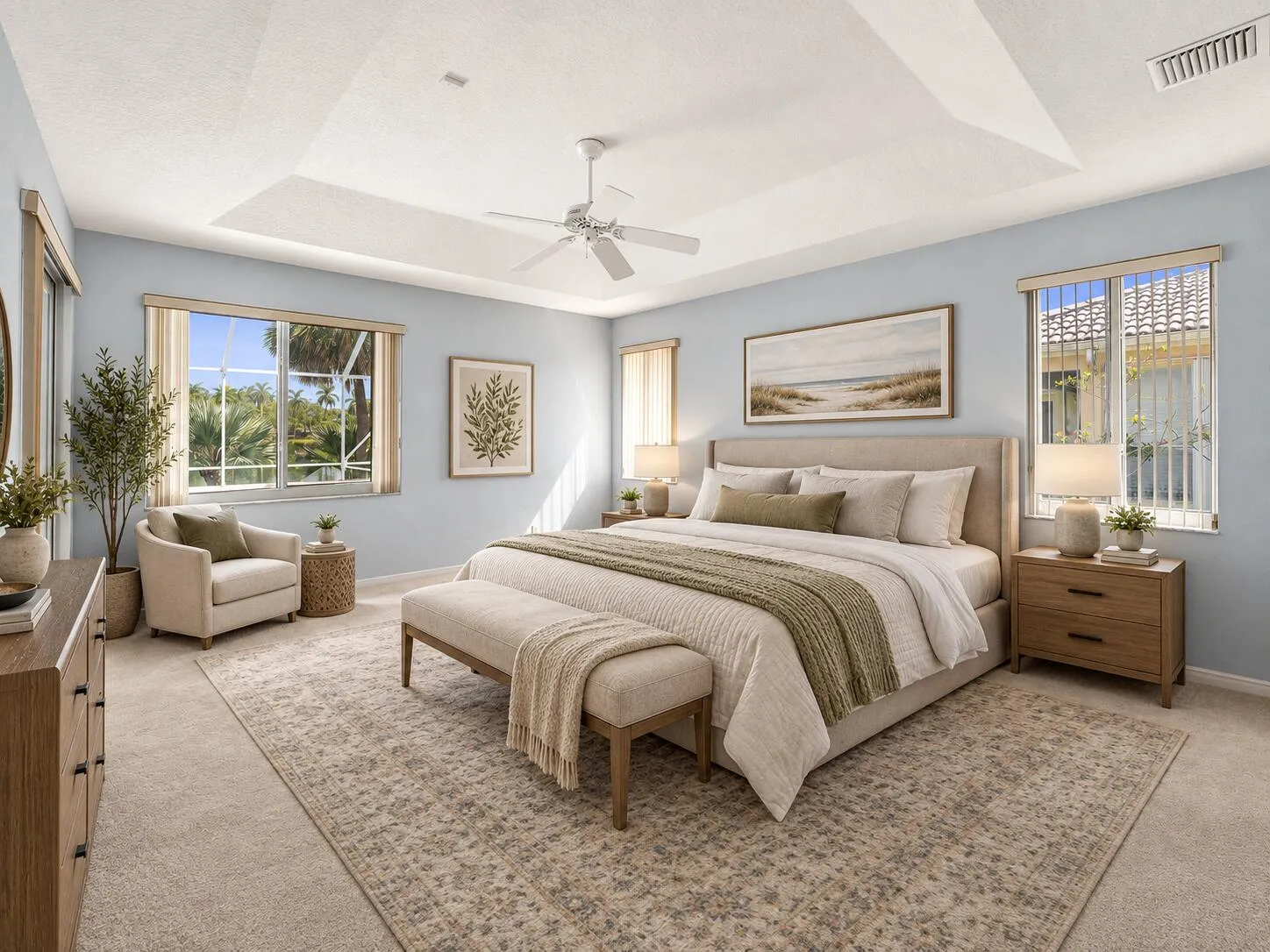 Primary bedroom overlooking pool, virtually staged
