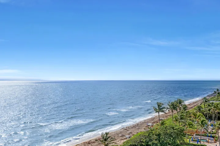 Expansive ocean frontage with a sandy beach