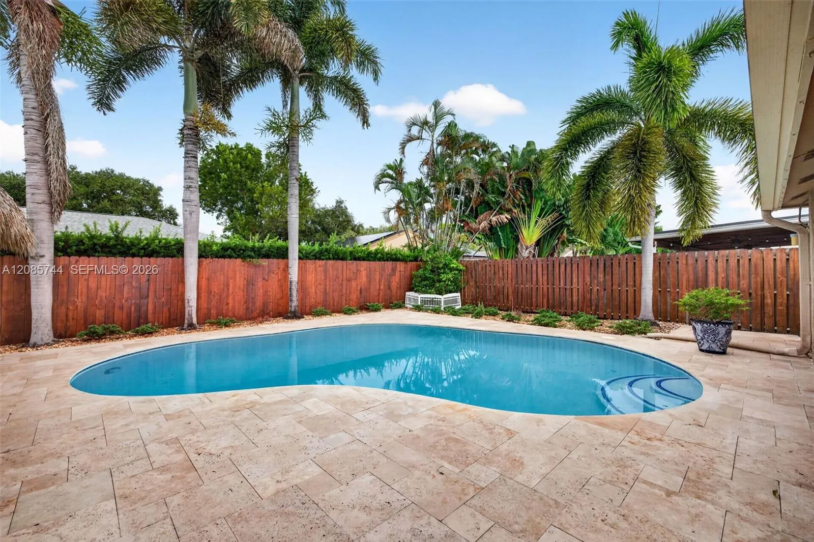 Gorgeous recently resurfaced pool w/ travertine decking, fully fenced, w/ amazing tiki hut, recently rethatched and new sprinkler pump Gorgeous recently resurfaced pool w/ travertine decking, fully fenced, w/ amazing tiki hut, recently rethatched and new sprinkler pump