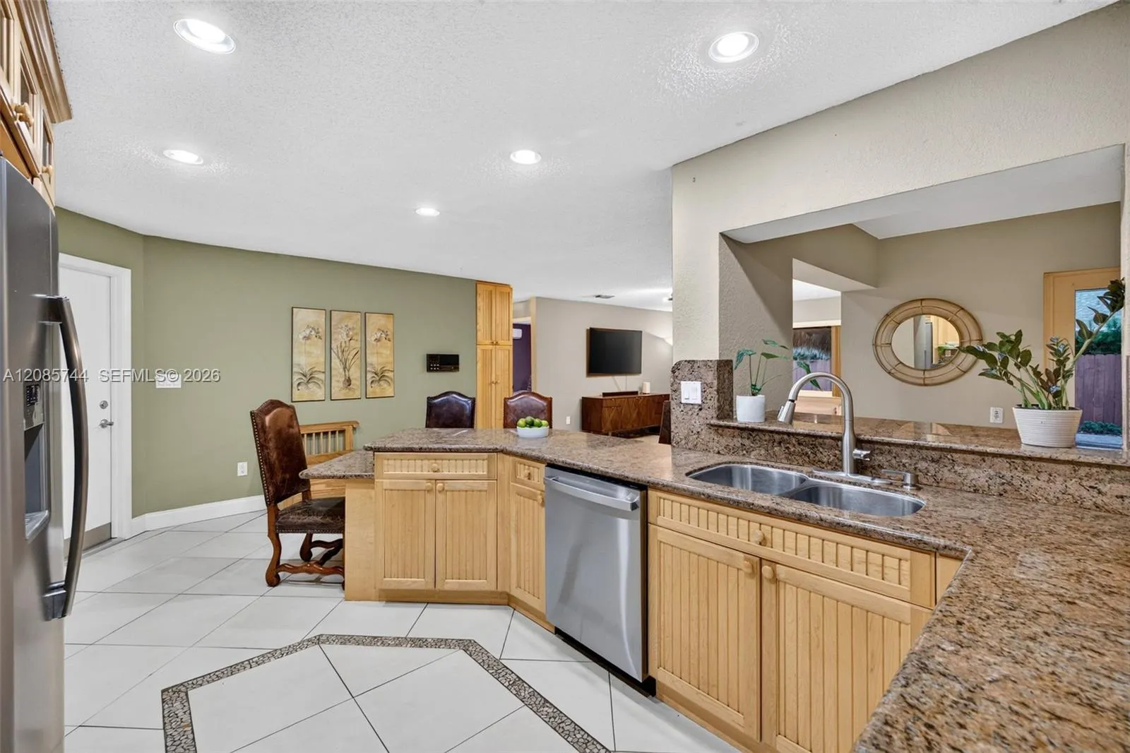Updated kitchen w/ stainless appliances and wood cabinets, granite counters Updated kitchen w/ stainless appliances and wood cabinets, granite counters