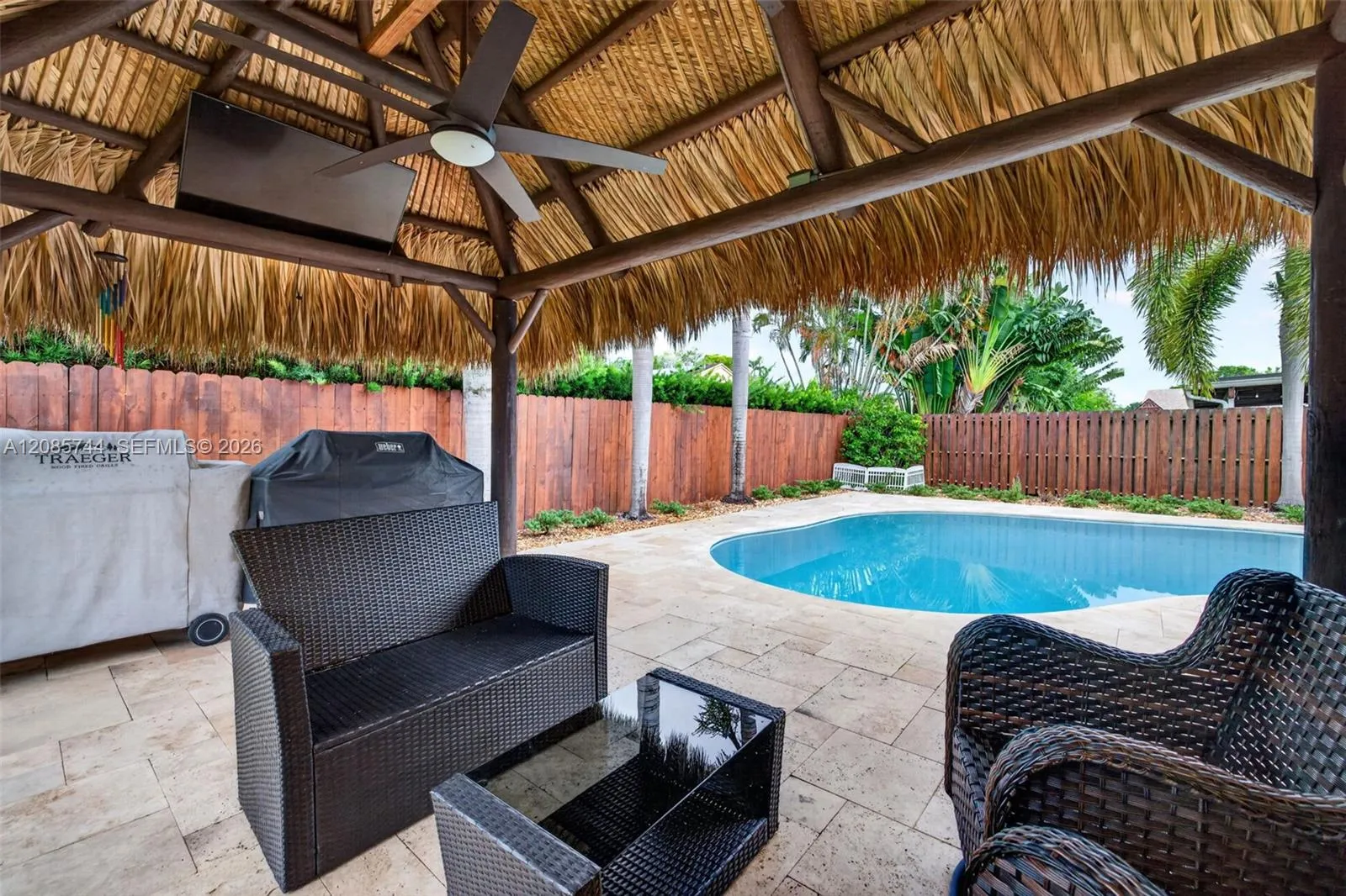 Gorgeous recently resurfaced pool w/ travertine decking, fully fenced, w/ amazing tiki hut, recently rethatched and new sprinkler pump Gorgeous recently resurfaced pool w/ travertine decking, fully fenced, w/ amazing tiki hut, recently rethatched and new sprinkler pump