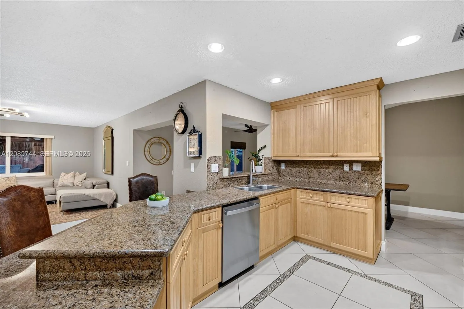 Updated kitchen w/ stainless appliances and wood cabinets, granite counters Updated kitchen w/ stainless appliances and wood cabinets, granite counters