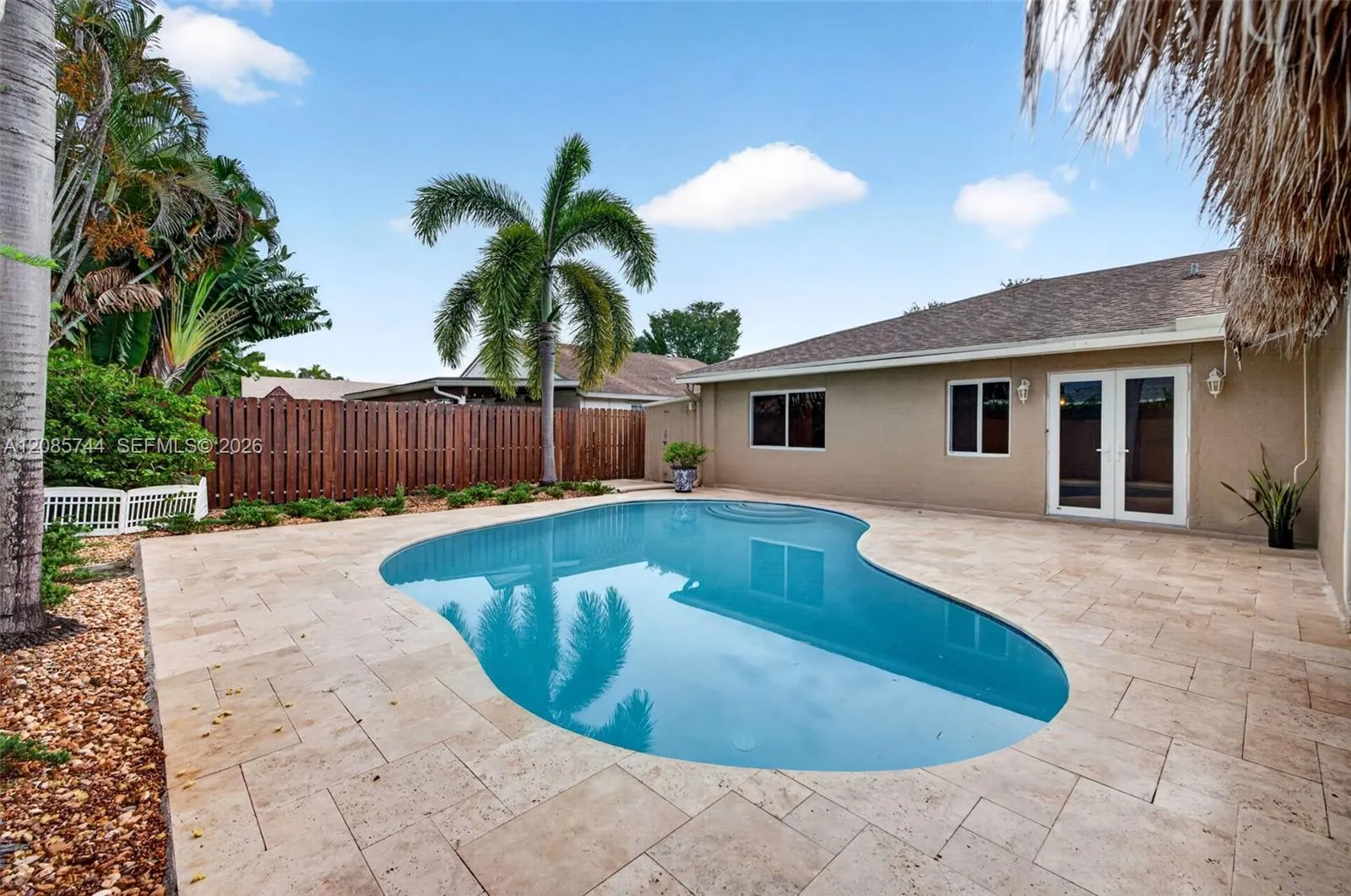 Gorgeous recently resurfaced pool w/ travertine decking, fully fenced, w/ amazing tiki hut, recently rethatched and new sprinkler pump Gorgeous recently resurfaced pool w/ travertine decking, fully fenced, w/ amazing tiki hut, recently rethatched and new sprinkler pump