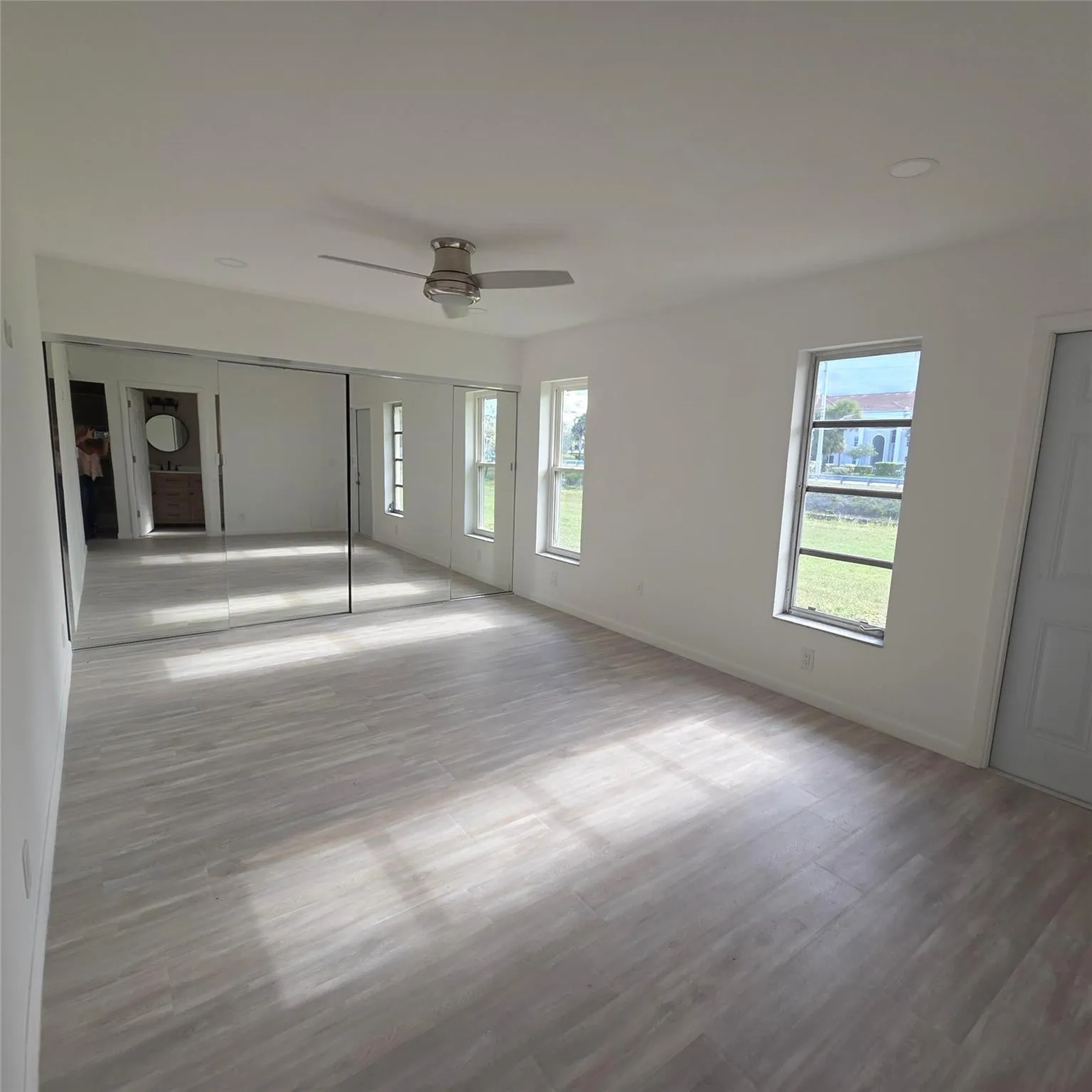 Master Bedroom has walk out door to backyard on the Canal