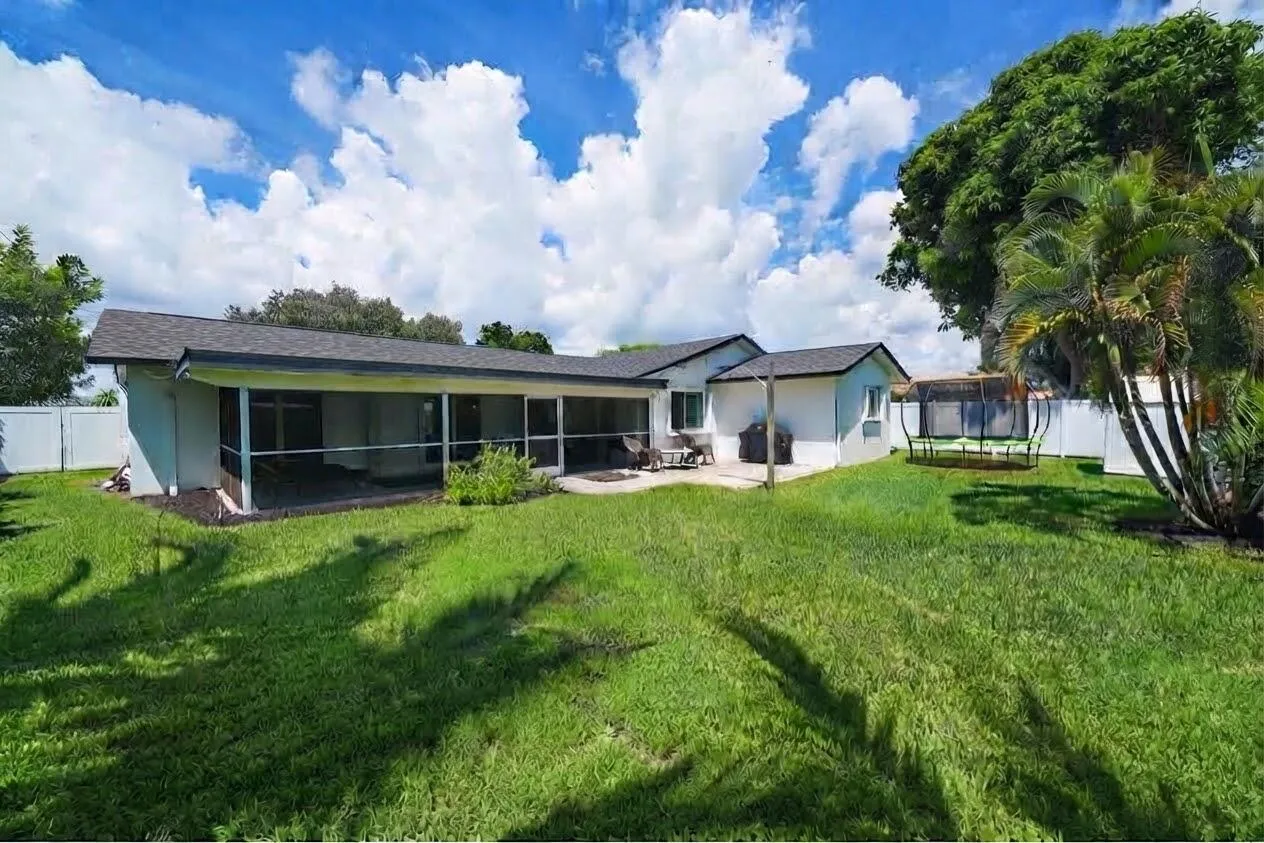 DOUBLE GATE ENTRY ON LEFT SIDE OF THE HOUSE