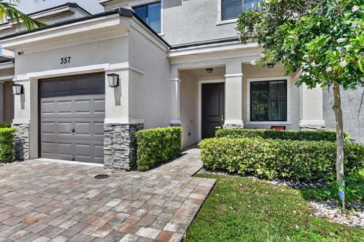 Move-in ready home with private, tropical rear yard for entertaining.
