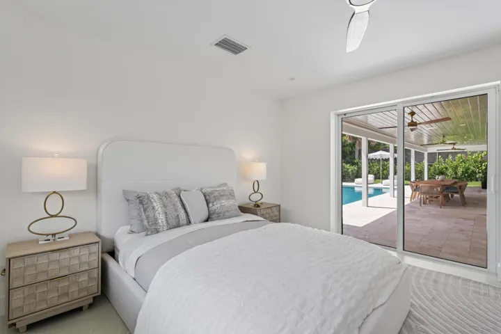 Bedroom en-suit with sliding glass door to pool