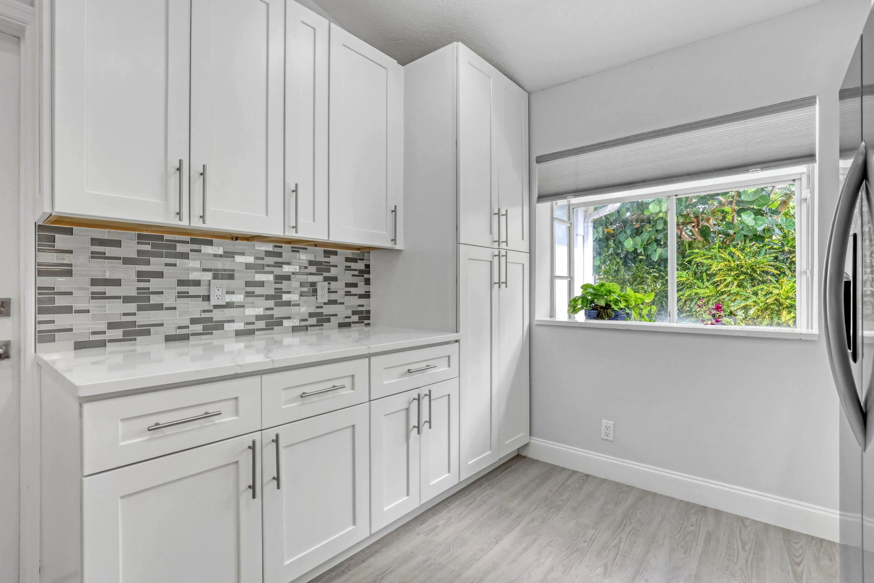 Cabinets are stocked with everything you will need from fancy wine glasses to Tervis tumblers.