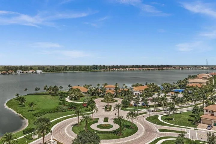 Aerial perspective showcasing a waterfront community with extensive lake frontage