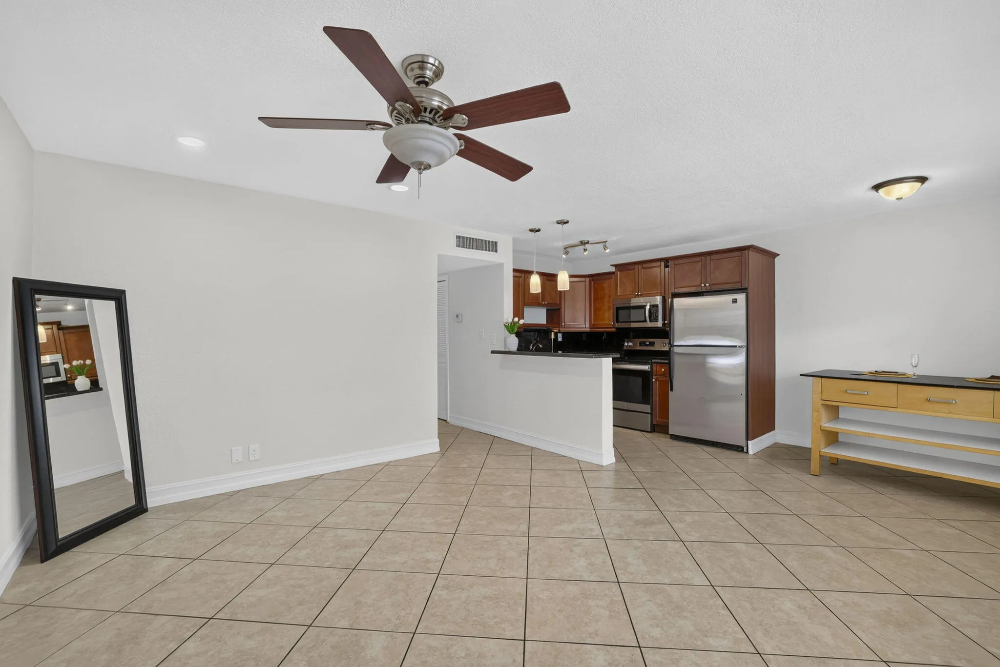 Tile flooring througout the unit, spacious living dining area.