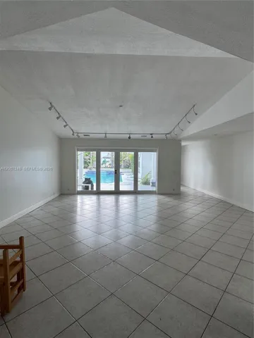 Living room overlooking pool