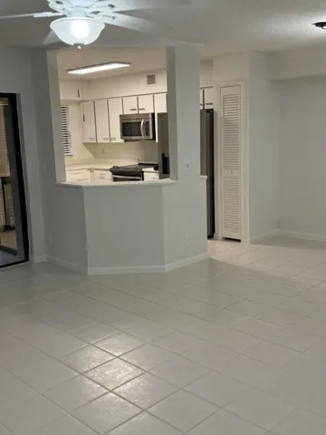 living room with entrance to kitchen