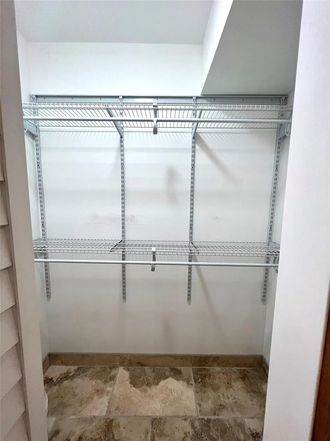 PRIMARY BEDROOM WALKING CLOSET