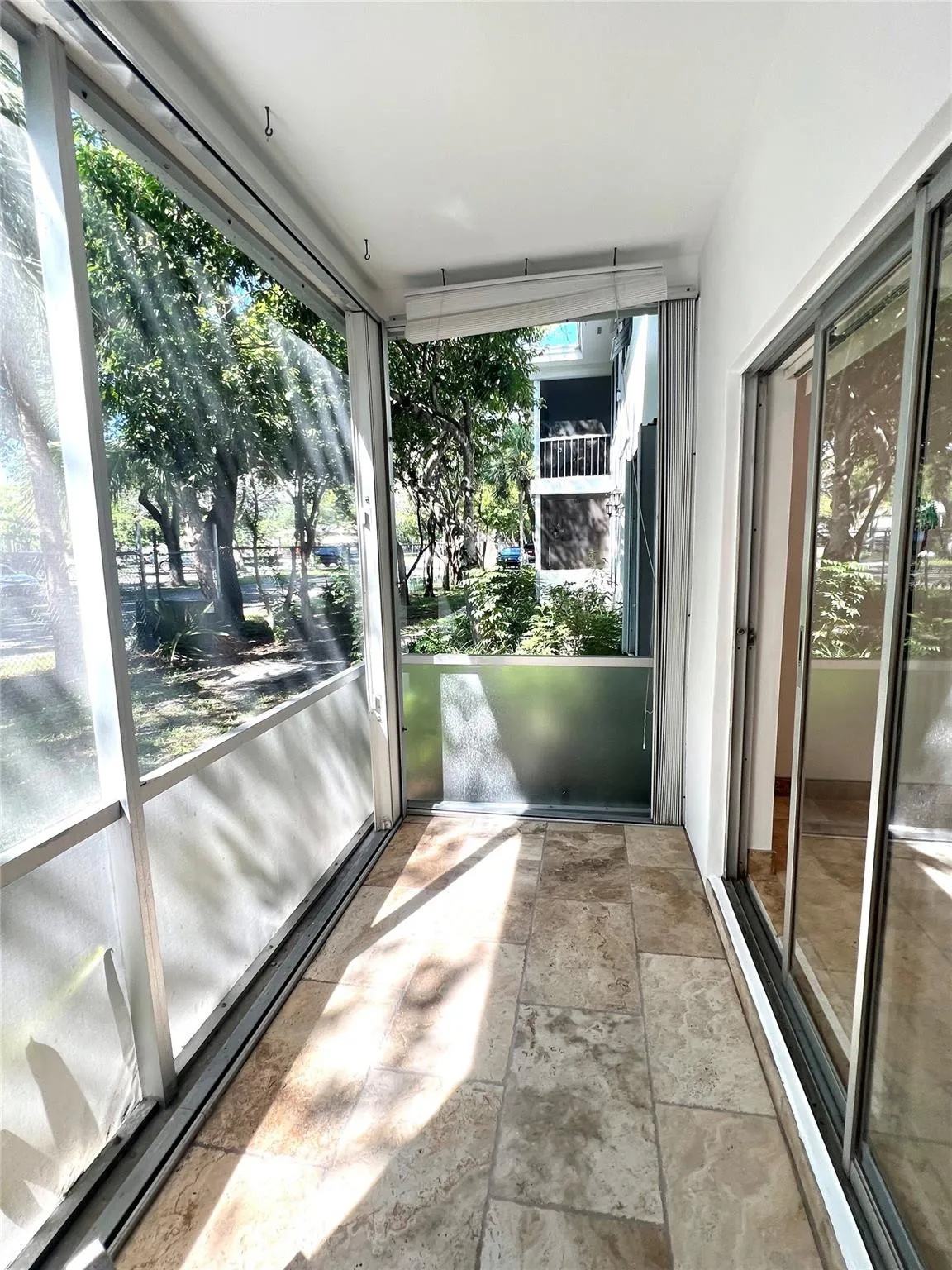 SCREENED PORCH - ACCORDION SHUTTERS