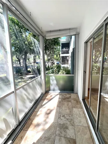 SCREENED PORCH - ACCORDION SHUTTERS