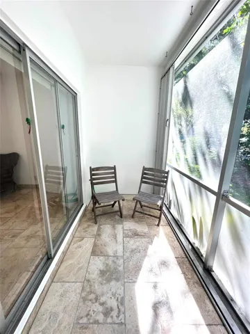 SCREENED PORCH - ACCORDION SHUTTERS