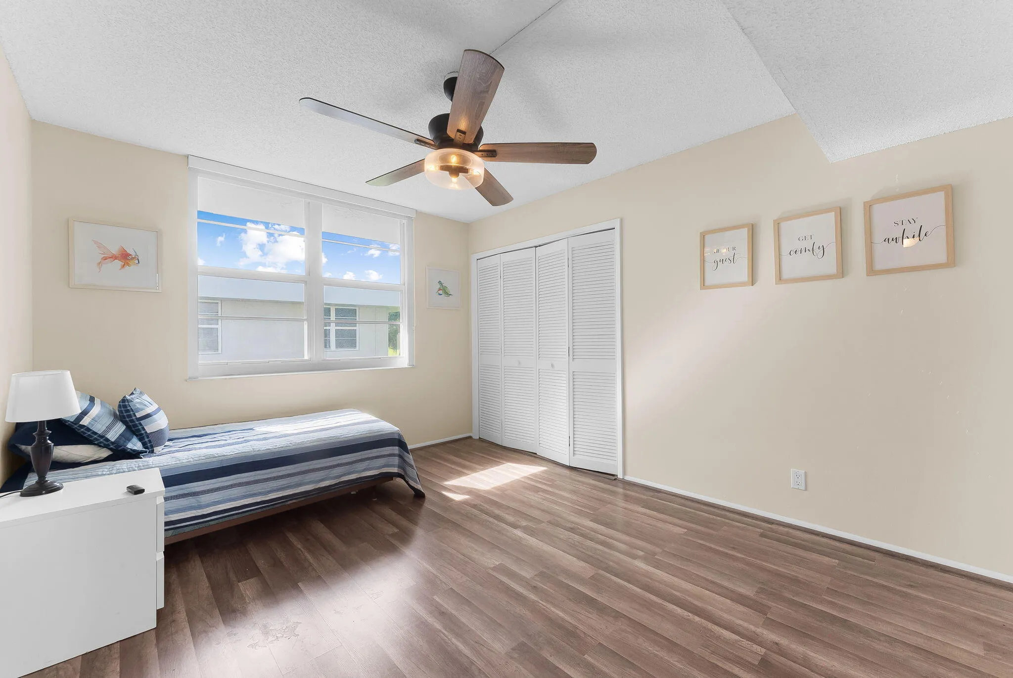 Spacious guest bedroom with plenty of room for guests.