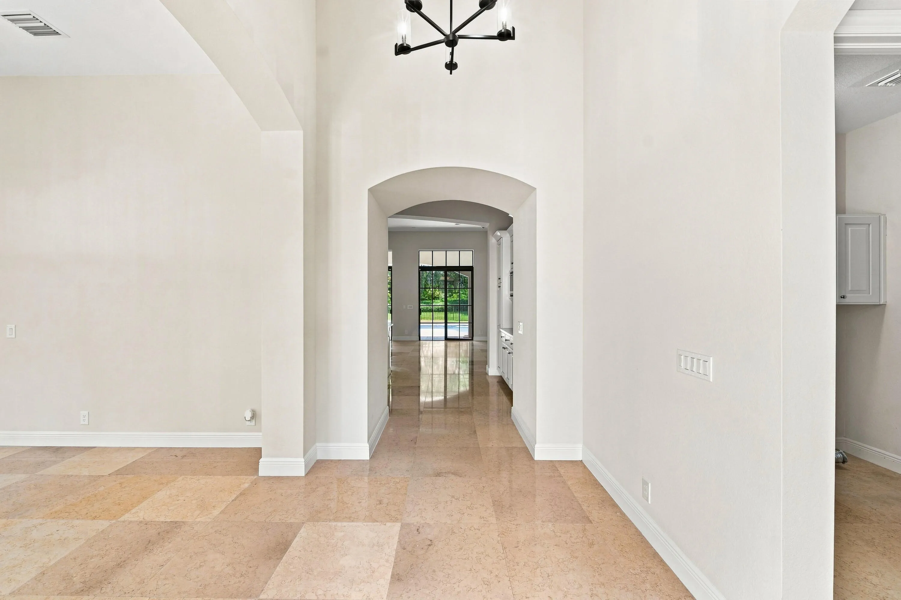 Welcoming foyer with fresh paint and fixtures