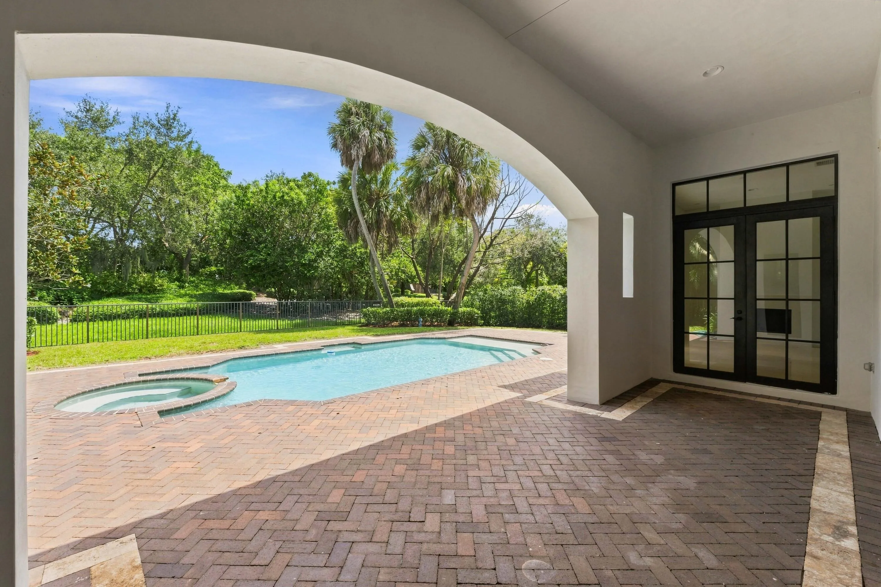 Covered patio overlooking the pool