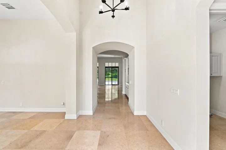 Welcoming foyer with fresh paint and fixtures