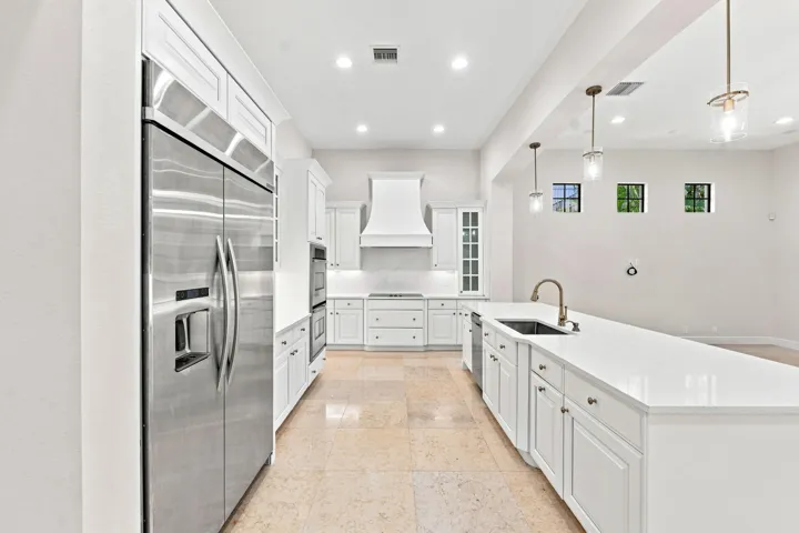 Renovated kitchen with updated cabinetry and fixtures