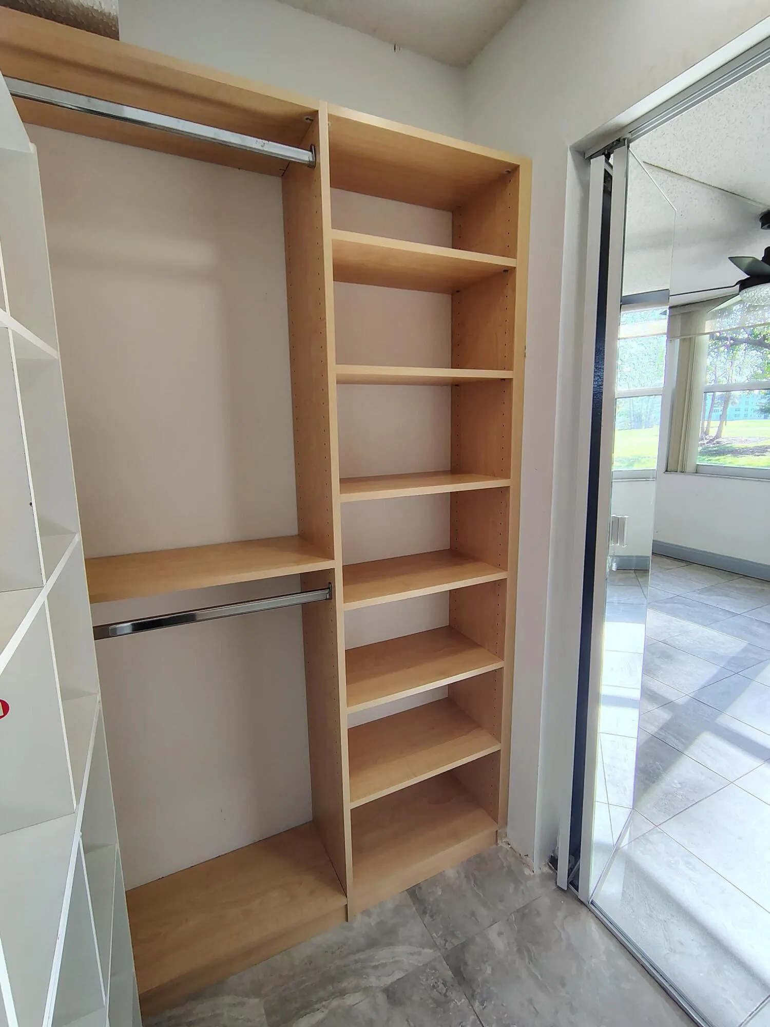 Bedroom Walk-in Closet With Built In Cabinets