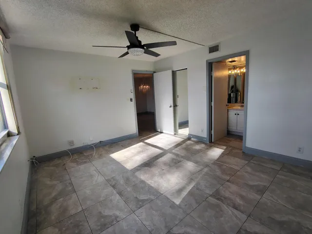 Spacious Bedroom With View Of Golf Course