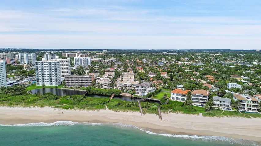 Coastal property with direct beach access and established landscaping