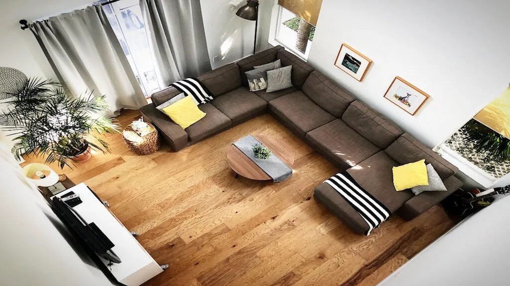 Wood-finish flooring throughout, complemented by white walls