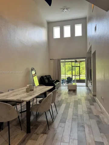 Dining Area + Living Room Shown