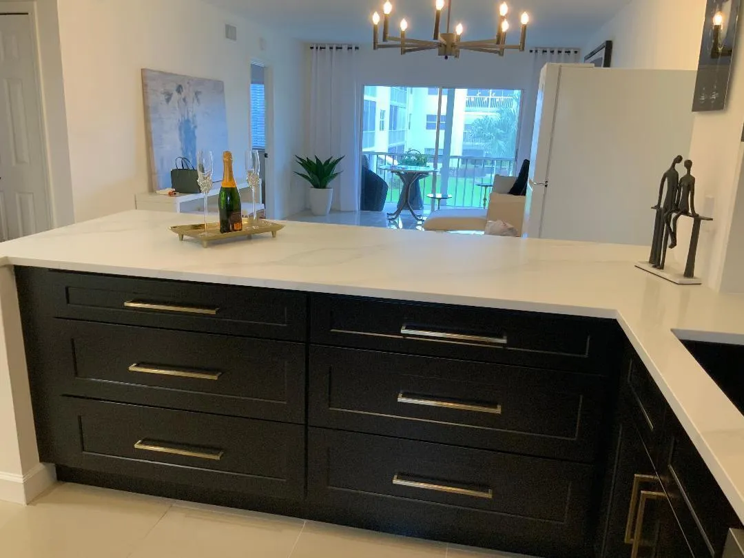 36" wide lower cabinets w/deep drawers afford so much storage space.