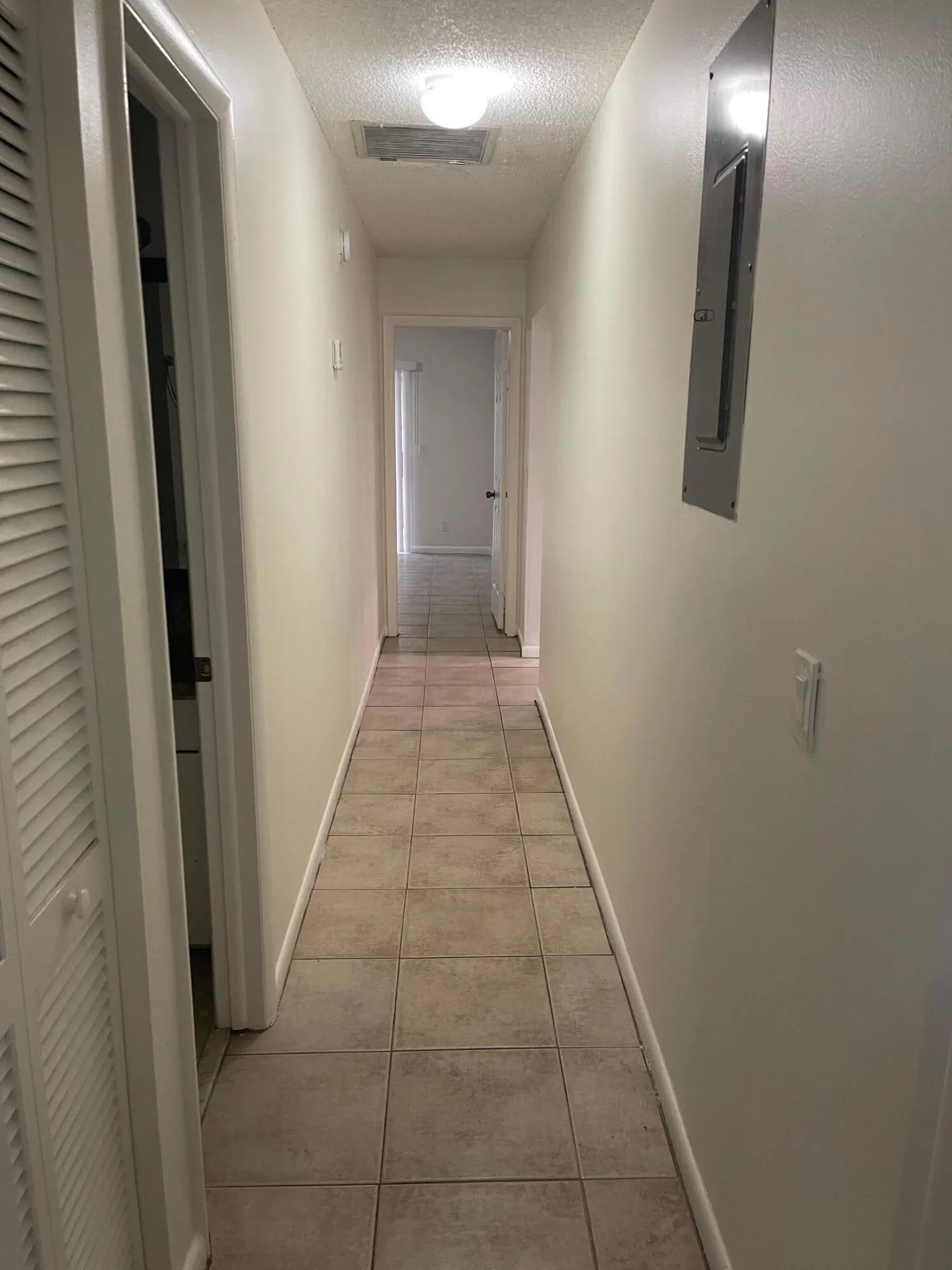 GUEST BATHROOM ON LEFT OF HALLWAY