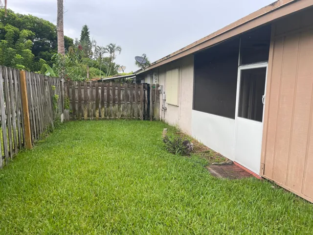 BACK YARD, FENCED IS GOING TO BE REPLACED.