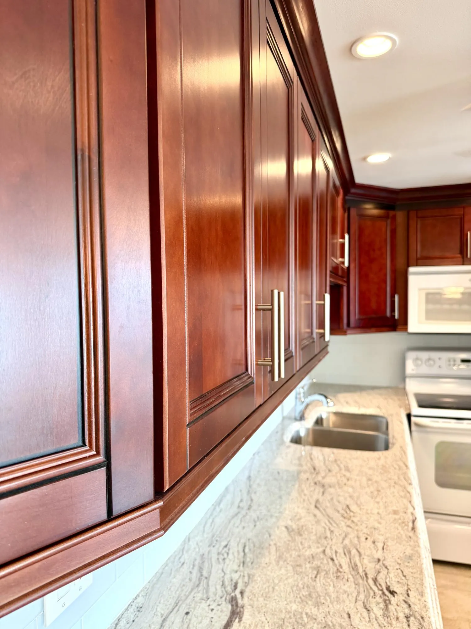 Beautiful Cherrywood Cabinets, Granite, and Backsplash