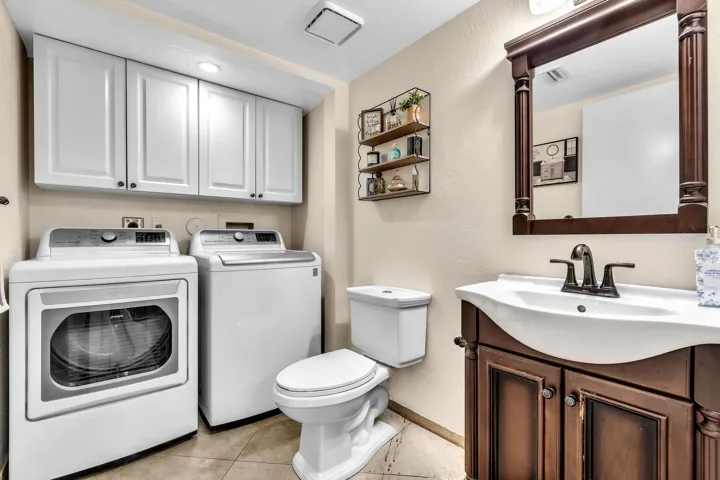 INSIDE LAUNDRY AREA AND HALF BATH