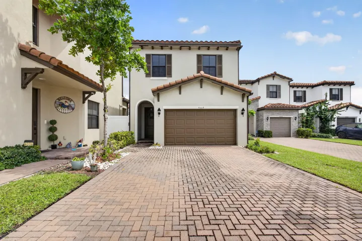 Spacious 3/2.5 features over 1,800SF of space for family gatherings. XL paver driveway parking for 8 cars!