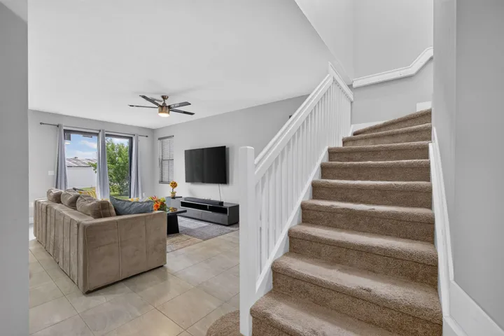 Stairs and entrance to living/family room.