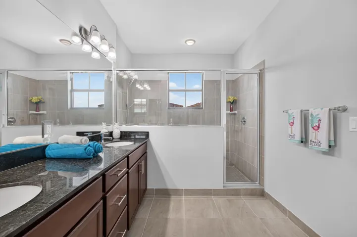 Oversized stall shower to wash away your stress.
