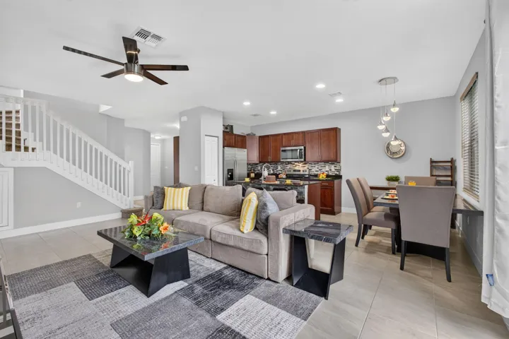 Living room features 9' knockdown finished ceilings and an open layout to gather with friends.