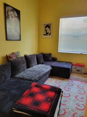 An oversized Den, Office, or a possible third bedroom if you add a closet.