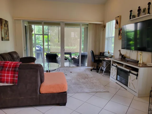 Soaring ceilings and Huge Living room add to the loftiness of this home.