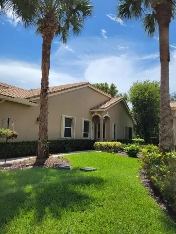 Lush green grass surrounds the property.